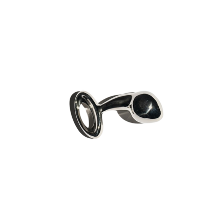 A small Luxy Stainless Steel Anal Plug.
