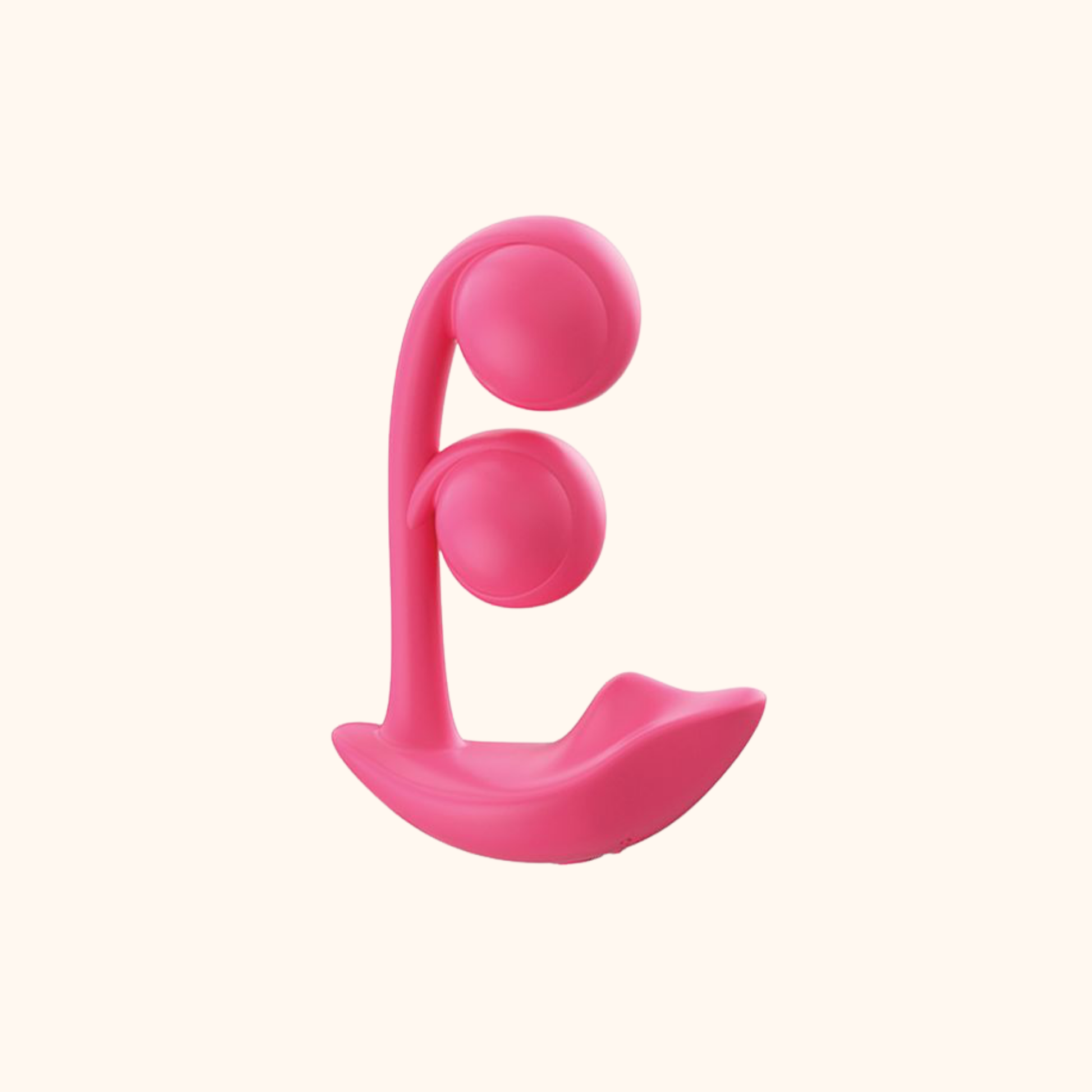 A pink Melody Wearable remote vibrator against a white background.