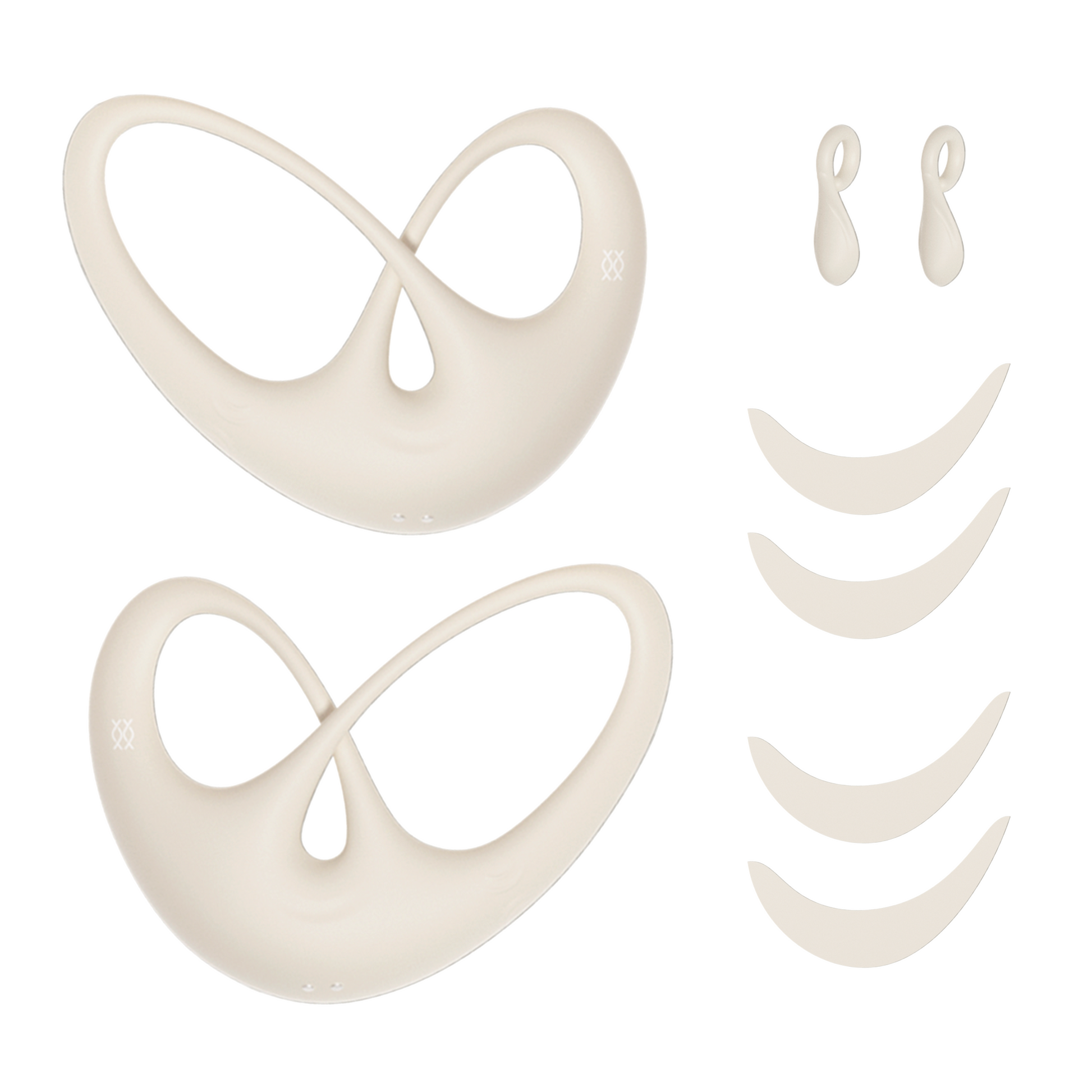 Set of two wearable nipple vibes, nipple covers, and attachments on a white background