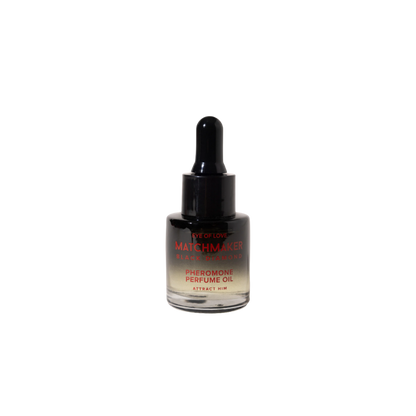 A black and white dropper bottle of Pheromone Perfume Oil Matchmaker Black Diamond by Eye of Love for Attract Him.