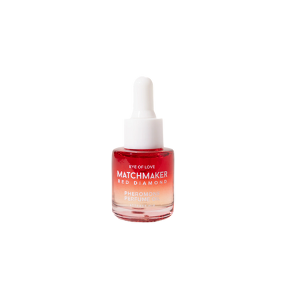 A red and white dropper bottle of Pheromone Perfume Oil Matchmaker Red Diamond by Eye of Love for Attract Her.