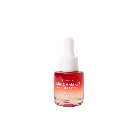 A red and white dropper bottle of Pheromone Perfume Oil Matchmaker Red Diamond by Eye of Love for Attract Her.
