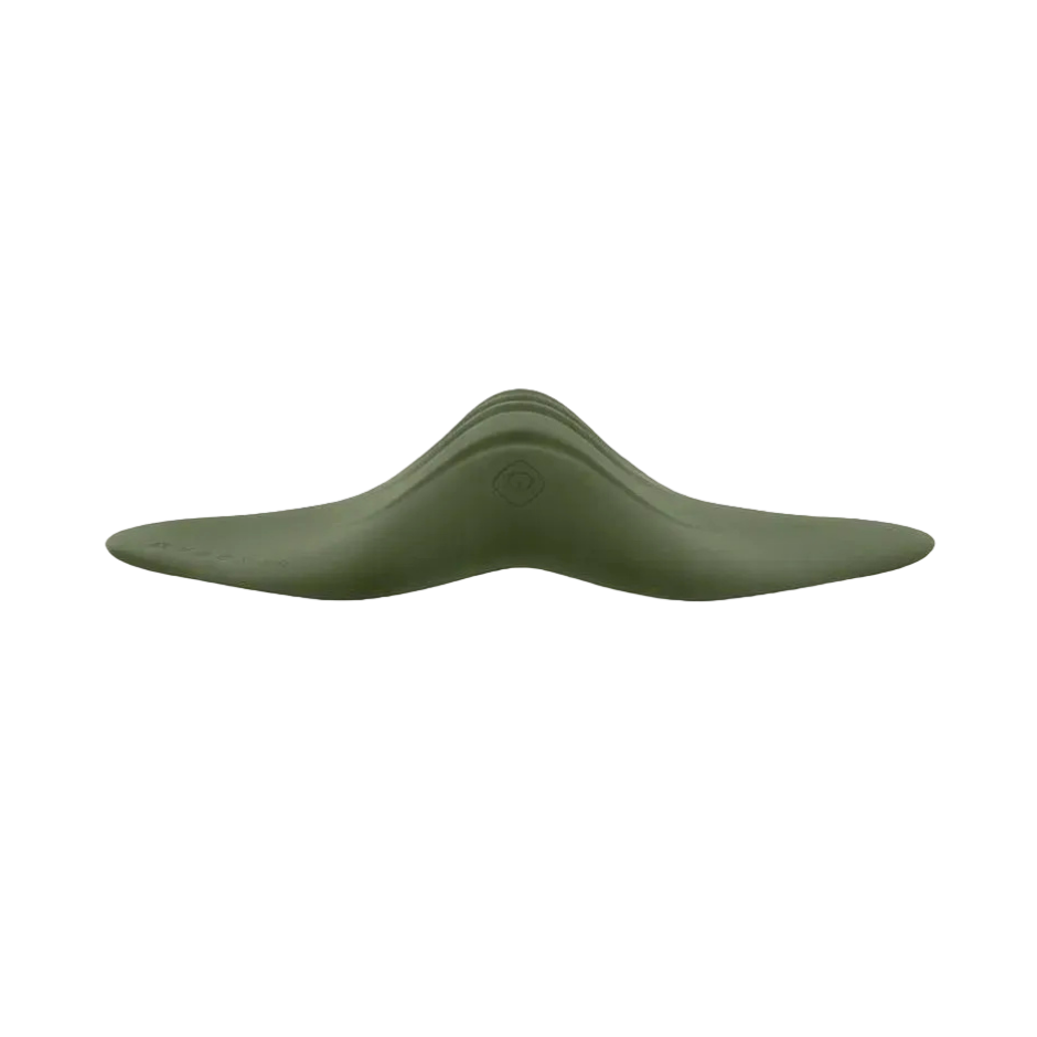 Side view of green grinder pad 