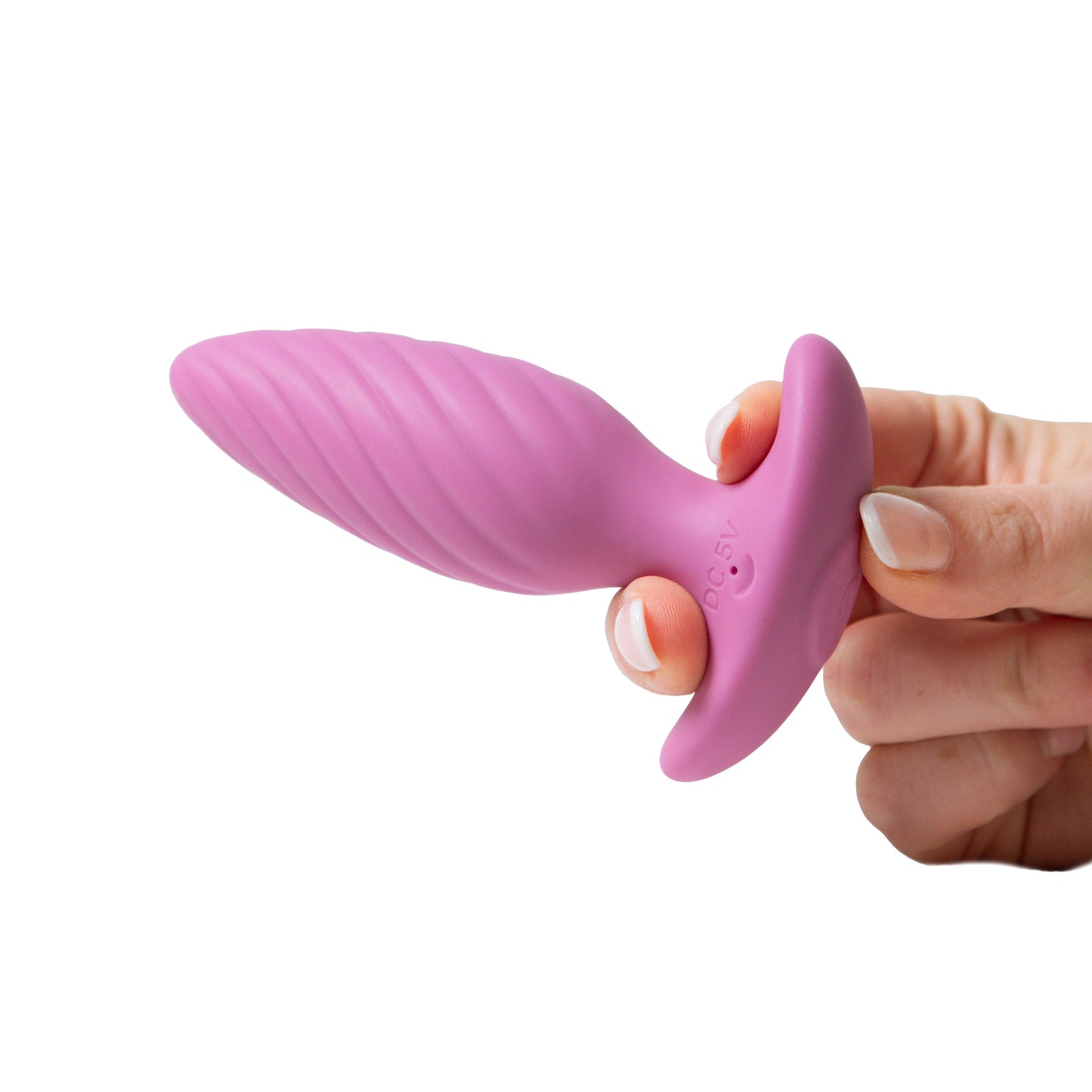 Pink silicone product held by a hand on a white background