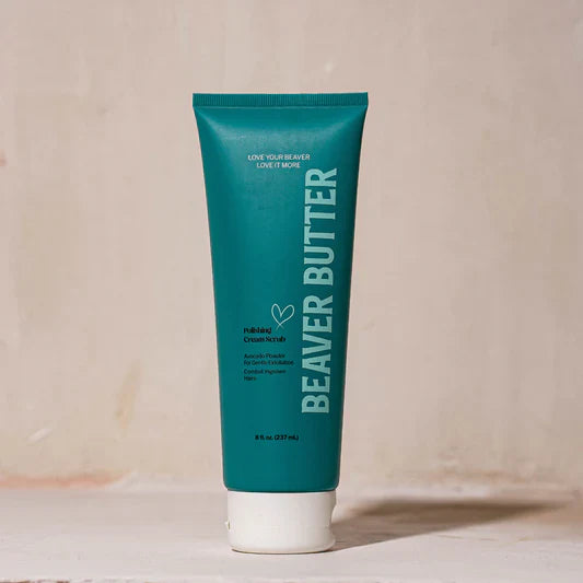 A teal bottle of Polishing Cream Scrub by Beaver Butter against a white background.