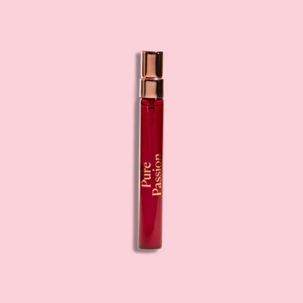 Red mini travel perfume with gold cap labeled 'Pure Passion' on a pink background by High on Love