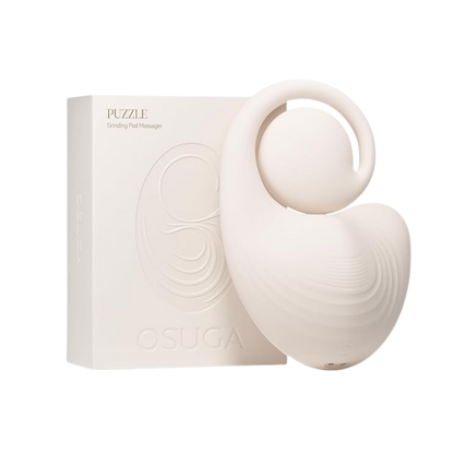 White Puzzle grinder pad next to the box.