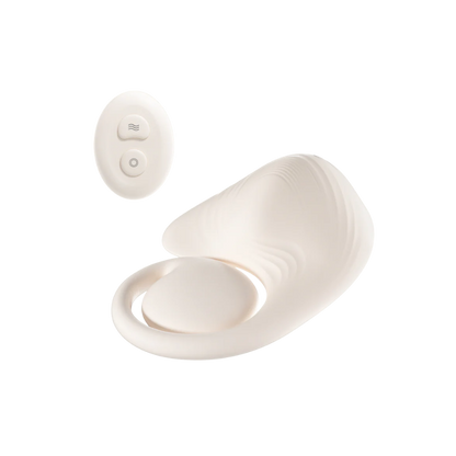 White Grider pad with remote next to it.