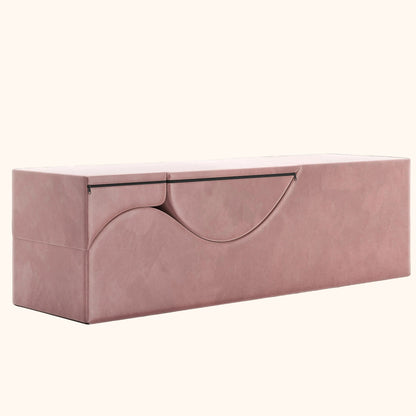 Rose Aria Flip Chaise by Liberator folded into a bench up into a rectangle against white background