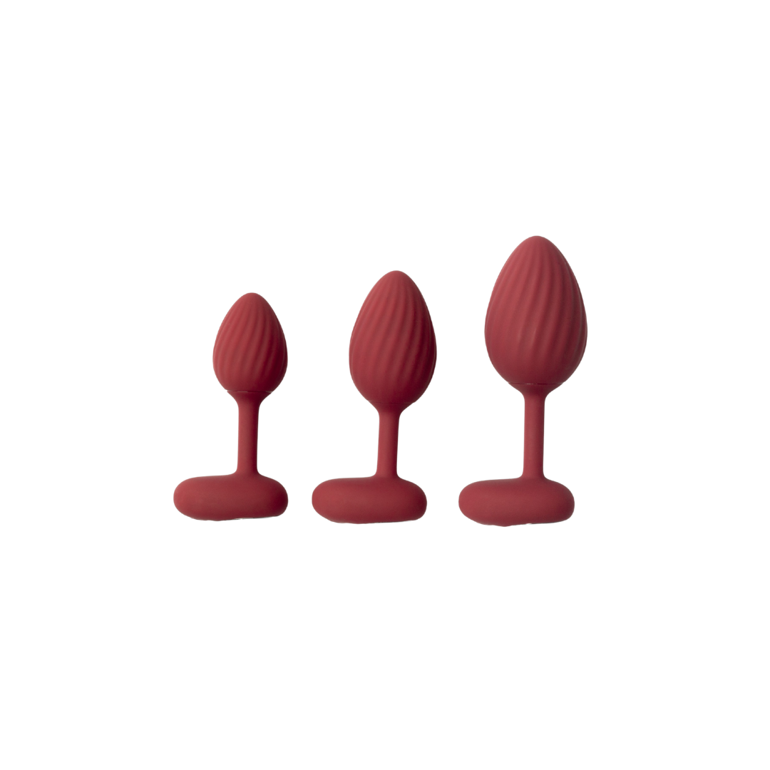 A set of three red graduated Rouge backdoor plugs.