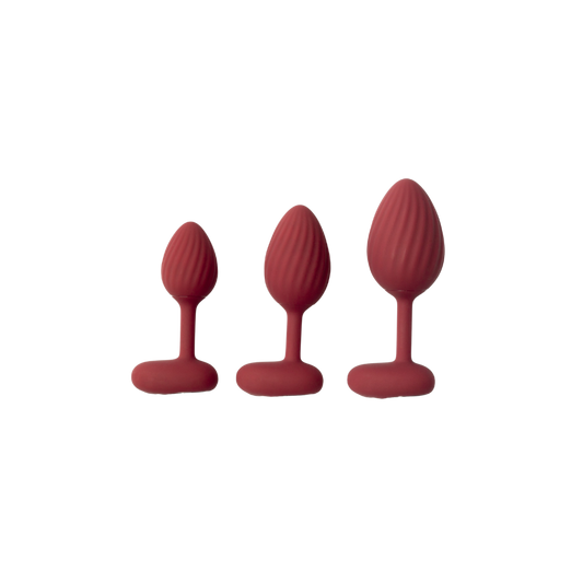 A set of three red graduated Rouge backdoor plugs.