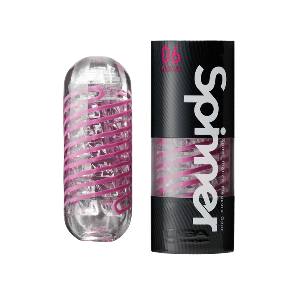 Clear male sleeve with pink drizzle and black packaging on a white background