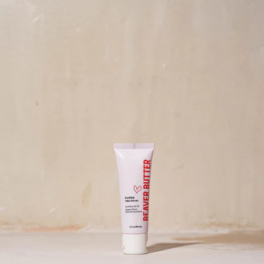 Soothing Vulva Serum on Beaver Butter pink bottle against a white background.
