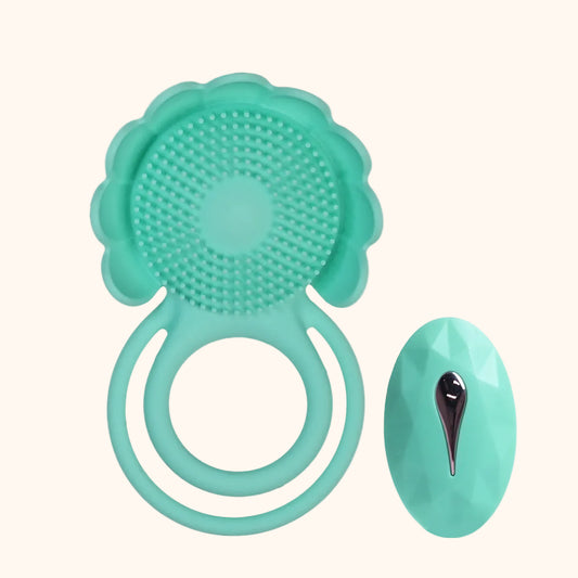 A teal Spring Fling cock ring and remote by Euforia against a white background.