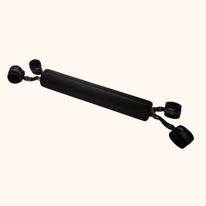 A black Talea Padded Spreader Bar, Bedroom Furniture by Liberator against a white background.