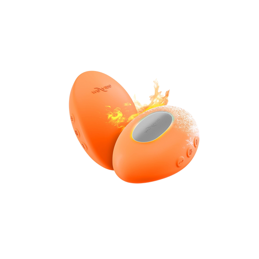 Two orange, temperature controlled vibrators by We Vibe.