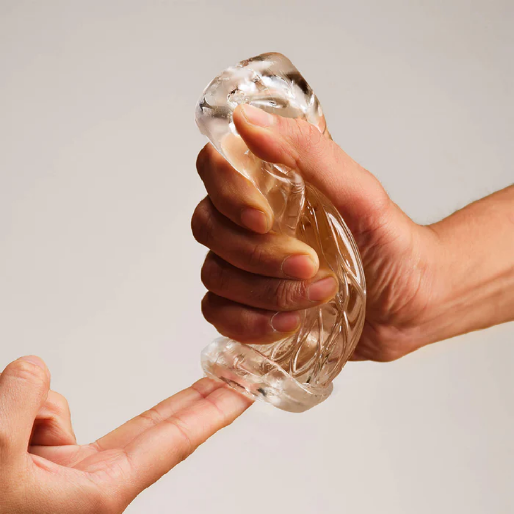 Two hands holding the Lotus Sleeve Handy 2 Accessory.