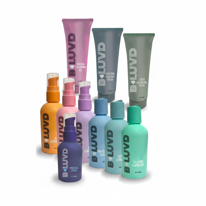 Collection of BLUVD personal care products including bottles and tubes on a white background