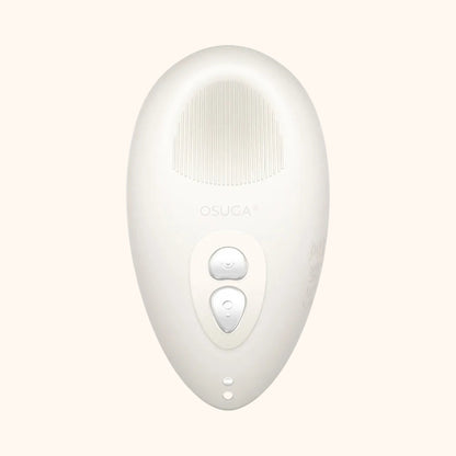 A white Tremble clitoral vibrator by Liberator against a white background.
