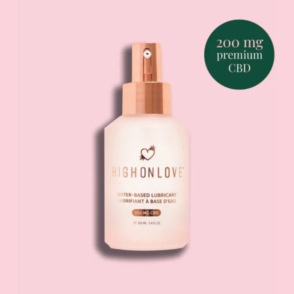 Bottle of High on Love water-based lubricant with 200 mg premium CBD on a pink background