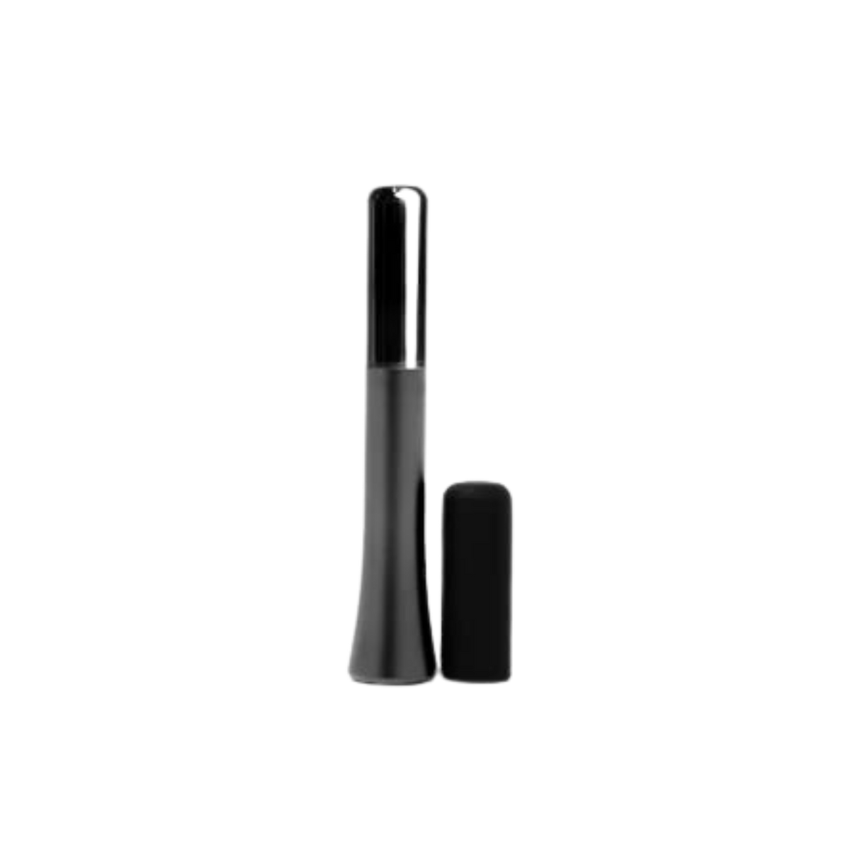 A Wink discreet vibrator in Gun Metal Black next to the black silicone cap.