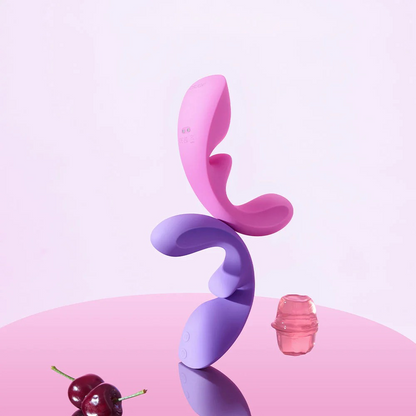 Pink and Purple Flow stacked on top of each other on a pink table.