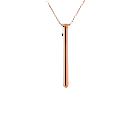 Rose gold necklace with a cylindrical pendant on a white background
